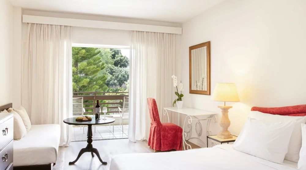 Superior Room Garden View & Private Balcony at Grecotel LuxMe Daphnila Bay