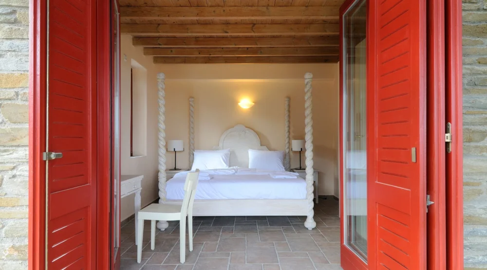 Junior Suite with Side Sea View at Aegea Blue Cycladic Resort