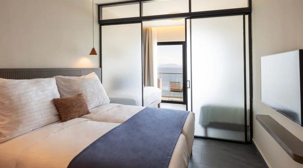 Family Room with Bunk Beds and Sliding Door Sea View at Valmar Corfu